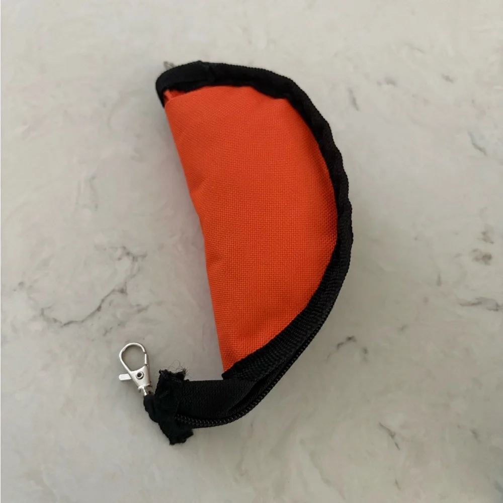 Dog & Company, collapsible portable dog bowl. Clip onto backpack or belt loop.